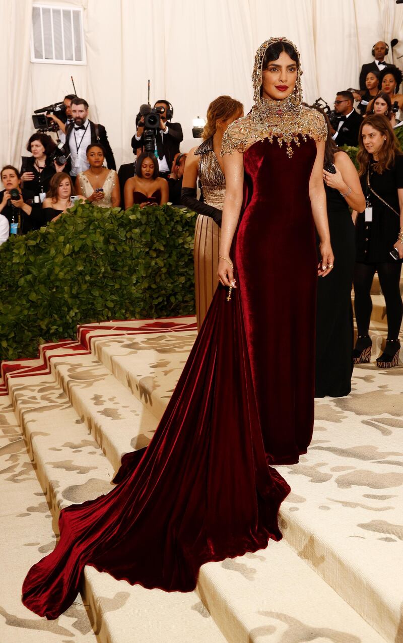 epa06718054 Priyanka Chopra arrives on the red carpet for the Metropolitan Museum of Art Costume Institute's benefit celebrating the opening of the exhibit 'Heavenly Bodies: Fashion and the Catholic Imagination' in New York, New York, USA, 07 May 2018. The exhibit will be on view at the Metropolitan Museum of Art's Costume Institute from 10 May to 08 October 2018.  EPA-EFE/JUSTIN LANE