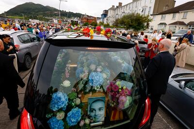 A hearse carrying the coffin of Sinead O'Connor in Bray, her home town in Ireland. The singer's funeral was private. Reuters