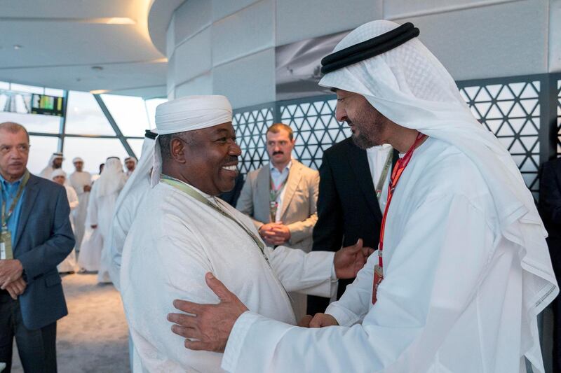 YAS ISLAND, ABU DHABI, UNITED ARAB EMIRATES - November 26, 2017: HH Sheikh Mohamed bin Zayed Al Nahyan Crown Prince of Abu Dhabi Deputy Supreme Commander of the UAE Armed Forces (R) greets HE Ali Bongo Ondimba, President of Gabon (L), at Shams Tower, during the final day of  Formula 1 Etihad Airways Abu Dhabi Grand Prix.
( Mohamed Al Hammadi / Crown Prince Court - Abu Dhabi )
---