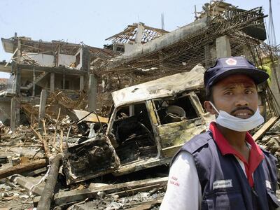 An Indonesian Red Cross volunteer at the site of the bombs in the tourist area of Kuta on Bali, on October 12, 2002. AFP