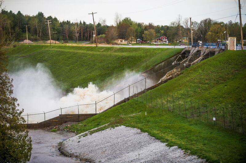 People living along two mid-Michigan lakes and parts of a river have been evacuated following several days of heavy rain. Midland Daily News via AP