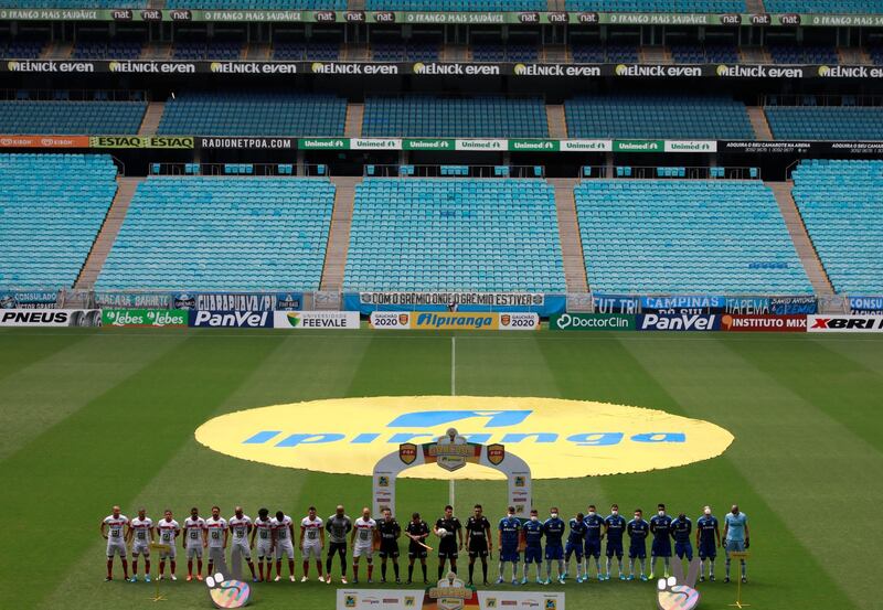 General view as the players line up before the match at Arena do Gremio in Porto Alegre, Brazil. Reuters