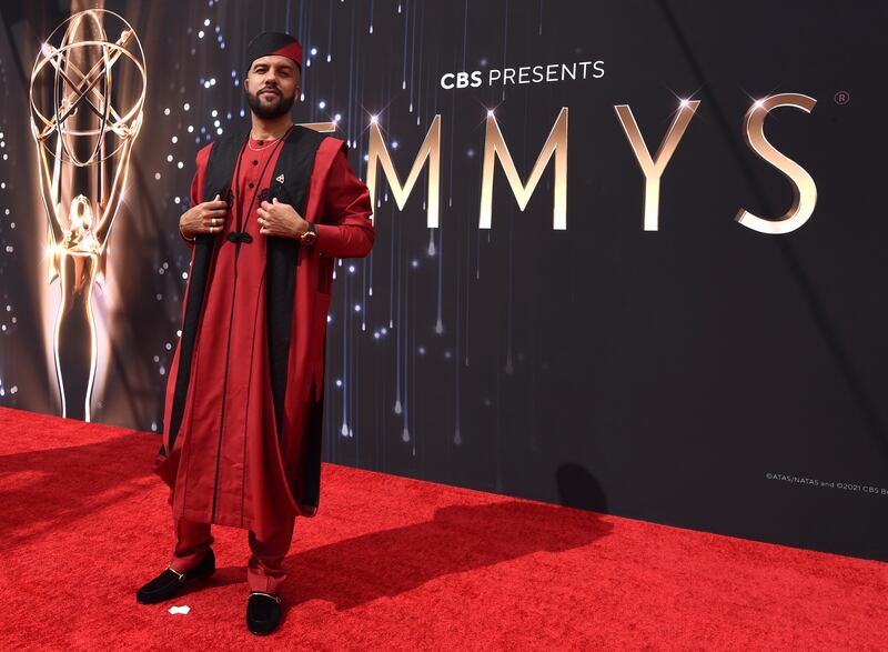 O-T Fagbenle in a  traditional Nigerian look in red with black accents by a Lagos brand, Sofisticat. AP