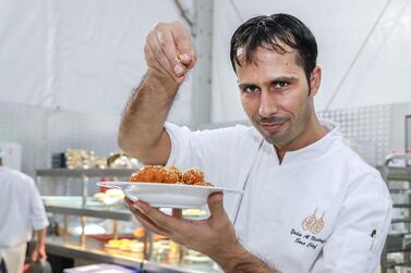 Chef Yahia Al Mustafa at work in the Emirates Palace Ramadan tent. Victor Besa / The National