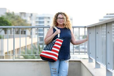 Abu Dhabi, United Arab Emirates - Gina Billon, UAE resident for the past 8 years, from United States celebrates the results of US elections. Khushnum Bhandari for The National