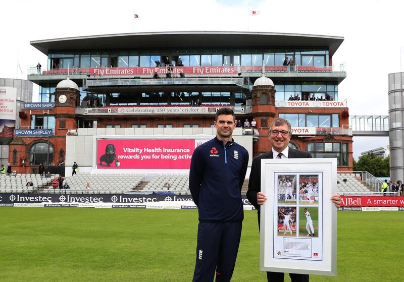 File photo dated 04-08-2017 of England's James Anderson is presented with a framed photo by Lancashire CCC Chairman David Hodgkiss OBE PA Photo. Issue date: Monday March 30, 2020. Lancashire chairman David Hodgkiss has died after contracting coronavirus. See PA story CRICKET Lancashire. Photo credit should read Simon Cooper/PA Wire.