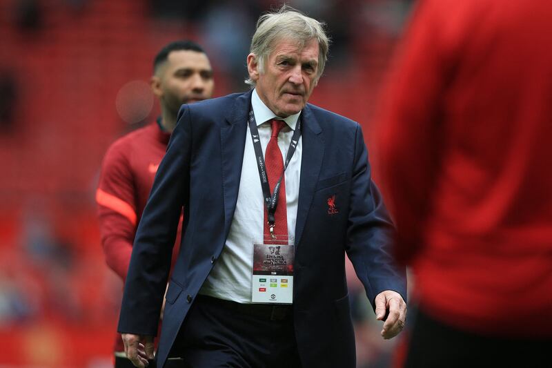 Former Liverpool star and manager Kenny Dalglish is on the pitch after the game. AFP