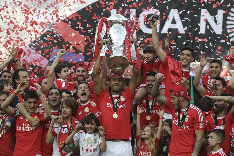 Benfica's players celebrate their team's victory in the Portuguese Primeira Liga to secure the league title on Sunday. Antonio Cotrim / EPA / May 15, 2016  