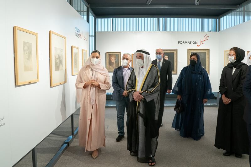 Sheikh Dr Sultan is given a tour of the exhibition during his visit.