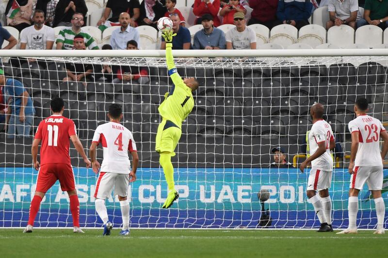 Shafi knocks the ball over the bar. AFP