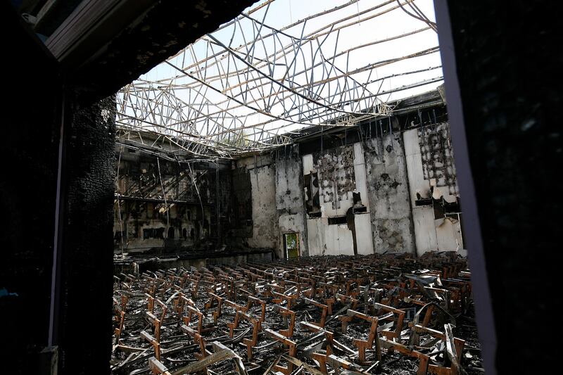 DUBAI, UNITED ARAB EMIRATES – Dec 22: Inside view of the Al Nasr Cinema after fire destroyed the complex yesterday (on sunday 21st Dec)  in Dubai. (Pawan Singh / The National) Story by Praveen *** Local Caption ***  PS06- ALNASR CINEMA.jpgPS06- ALNASR CINEMA.jpg