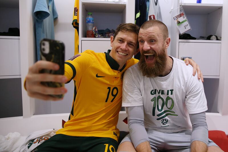 Craig Goodwin and Andrew Redmayne of Australia celebrate in the dressing room. Getty Images