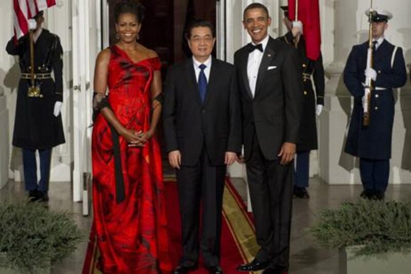 Michelle Obama, Hu Jintao and Barack Obama.
