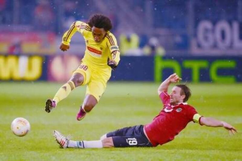 Anzhi Makhachkala's Willian, left, was added in January and is one of the club's several big-money recruits. Patrik Stollarz / AFP