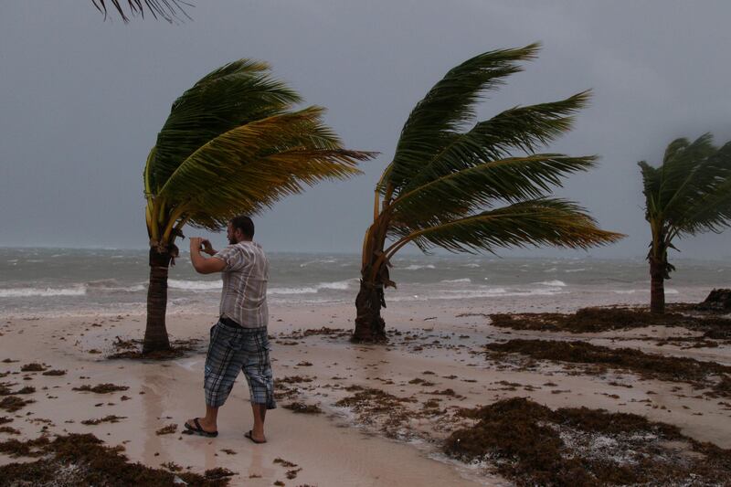 A man photographs the waves before the arrival of Hurricane Maria in Punta Cana, Dominican Republic. Ricardo Rojas / Reuters