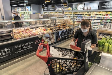 Nearly half of all UAE consumers are looking for ways to save money while shopping, according to a survey by McKinsey. Photo: Antonie Robertson / The National