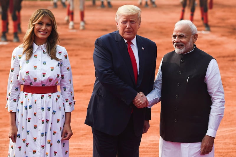India's Prime Minister Narendra Modi greets US President Donald Trump and First Lady Melania Trump during a ceremonial reception at Rashtrapati Bhavan. AFP