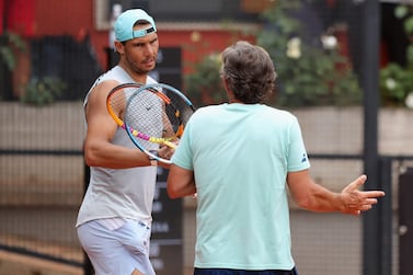 ROME, ITALY - MAY 08:  Rafael Nadal of Spain speaks with his head coach during the training at the Internazionali BNL D'Italia at Foro Italico on May 8, 2022 in Rome, Italy.  (Photo by Paolo Bruno / Getty Images)