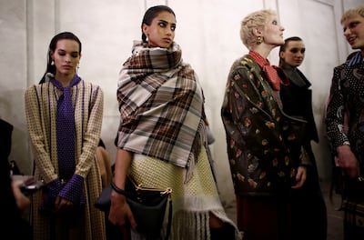Models wait backstage ahead of the Etro autumn/winter show in Milan. Reuters