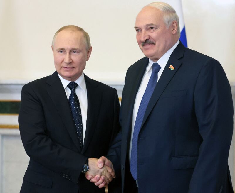 Russian President Vladimir Putin, left, and his Belarusian counterpart Alexander Lukashenko during a meeting in Russia. AFP