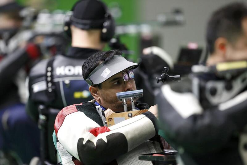 Abdullah Sultan Al Aryani of UAE in action in the men's 10-metre air rifle competition at the Rio 2016 Paralympic Games. Al Aryani won a silver medal. Carlos Garcia Rawlins / Reuters