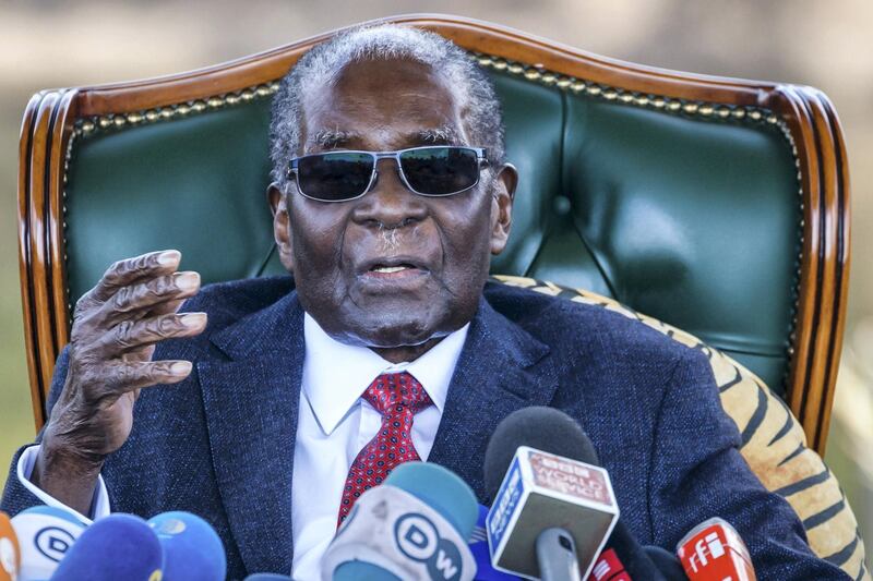 (FILES) In this file photo taken on November 17, 2017, Zimbabwe's then President Robert Mugabe delivers a speech during a graduation ceremony at the Zimbabwe Open University in Harare, where he presides as the Chancellor. - Zimbabwe ex-president Robert Mugabe has died aged 95 according to official on September 6, 2019. (Photo by Jekesai NJIKIZANA / AFP)