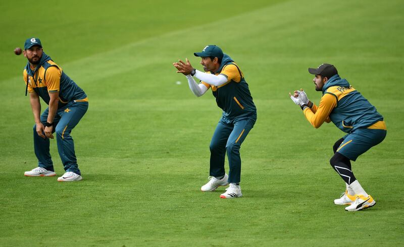 Yasir Shah, Asad Shafiq and and Babar Azam of Pakistan practice slip catching. Getty