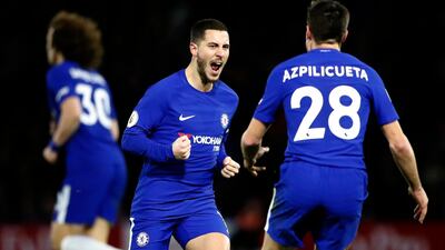 Chelsea's Eden Hazard celebrates after scoring during the English Premier League soccer match between Watford and Chelsea at Vicarage Road stadium in London, Monday, Feb. 5, 2018.(AP Photo/Frank Augstein)
