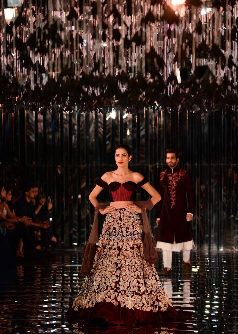 Rich Kashmiri embroidery embellished the menswear as well as some of the gowns and lehengas. AFP