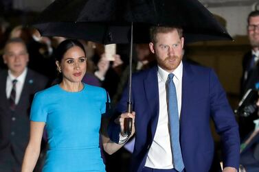 Prince Harry and Meghan Markle are continuing to campaign for women's education. AP Photo