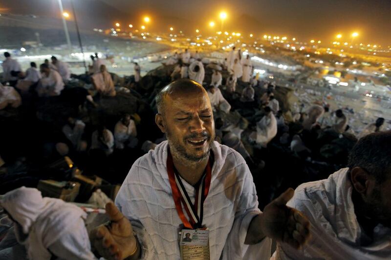 Pilgrims pray on the rocky slopes of the Mount of Mercy on the Plain of Arafat where, in the final year of his life, the Prophet Mohammed gave his famed Farewell Sermon in which he spoke about the equality of mankind, the rights of women and denounced extremism. Amr Nabil / AP Photo