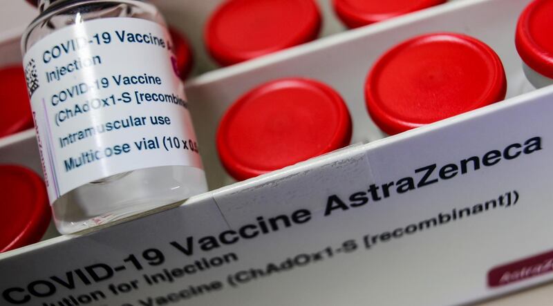 FILE PHOTO: A vial with the AstraZeneca's coronavirus disease (COVID-19) vaccine is pictured in Berlin, Germany, March 16, 2021. REUTERS/Hannibal Hanschke/File Photo