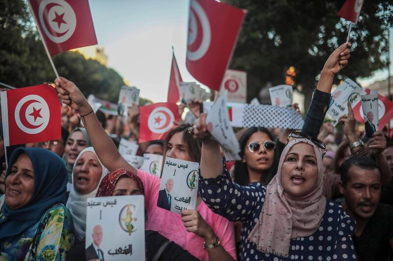 Supporters of independent Tunisian Presidential candidate Kais Saied attend a rally on the last day of campaigning before the second round of the presidential elections, in Tunis, Tunisia. AP Photo