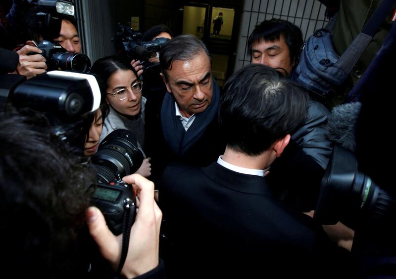 FILE PHOTO: Former Nissan Motor Chairman Carlos Ghosn leaves his lawyer Junichiro Hironaka's office in Tokyo, Japan, March 12, 2019. REUTERS/Issei Kato/File Photo