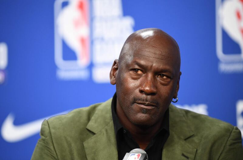 (FILES) In this file photo taken on January 24, 2020 former NBA star and owner of Charlotte Hornets team Michael Jordan looks on as he addresses a press conference ahead of the NBA basketball match between Milwaukee Bucks and Charlotte Hornets at The AccorHotels Arena in Paris. Michael Jordan said June 5, 2020, he is making a record $100 million donation to groups fighting for racial equality and social justice amid a wave of protests across the United States. / AFP / FRANCK FIFE
