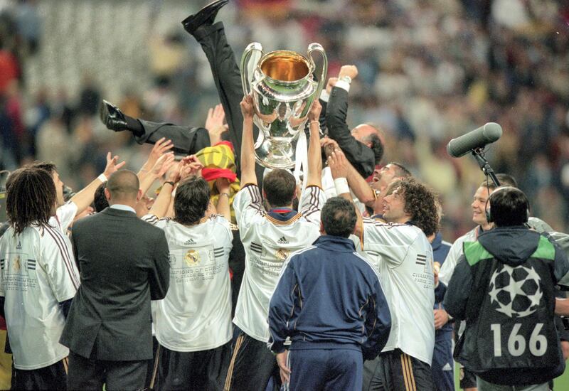 24 May 2000:  Real Madrid players hold up the Madrid coach Vicente Del Bosque after the European Champions League Final 2000 against Valencia at the Stade de France, Saint-Denis, France. Real Madrid won 3-0. \ Mandatory Credit: Graham Chadwick /Allsport