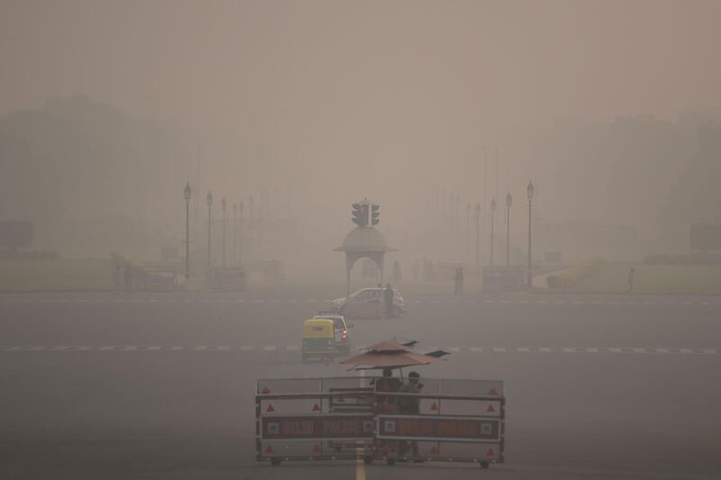 Commuters are seen making their way to work. AFP