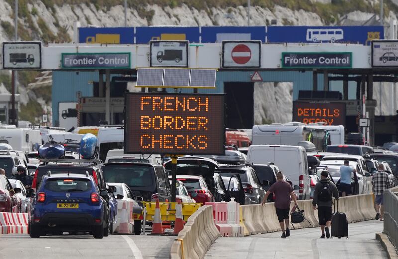 Drivers queue for French border checks at the port of Dover on the south coast of England. PA