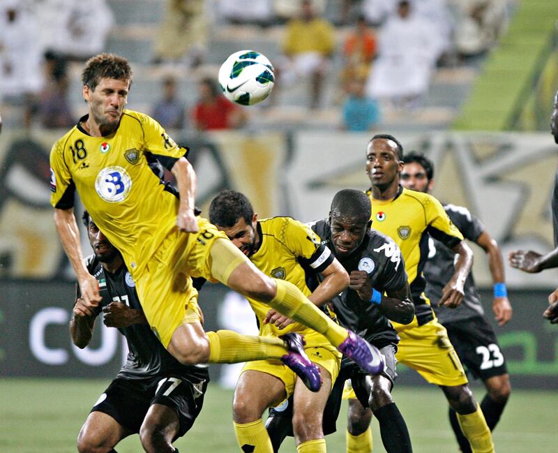 DUBAI, UNITED ARAB EMIRATES - October 10, 2012- Al Wasl's Emiliano Alfaro heads the ball against Al Dhafra during first half football action in Zabell Stadium in Dubai City, Dubai October 10, 2012. (Photo by Jeff Topping/The National)