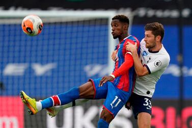 Crystal Palace's Ivorian striker Wilfried Zaha (L) vies with Tottenham Hotspur's Welsh defender Ben Davies during the English Premier League football match between Crystal Palace and Tottenham Hotspur at Selhurst Park in south London on July 26, 2020. RESTRICTED TO EDITORIAL USE. No use with unauthorized audio, video, data, fixture lists, club/league logos or 'live' services. Online in-match use limited to 120 images. An additional 40 images may be used in extra time. No video emulation. Social media in-match use limited to 120 images. An additional 40 images may be used in extra time. No use in betting publications, games or single club/league/player publications. / AFP / POOL / Will Oliver / RESTRICTED TO EDITORIAL USE. No use with unauthorized audio, video, data, fixture lists, club/league logos or 'live' services. Online in-match use limited to 120 images. An additional 40 images may be used in extra time. No video emulation. Social media in-match use limited to 120 images. An additional 40 images may be used in extra time. No use in betting publications, games or single club/league/player publications.