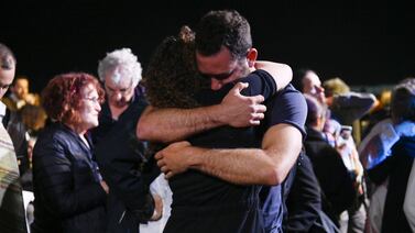 People embrace at the 18th joint memorial ceremony, held in Tel Aviv in May 2023. Photo: Combatants for Peace