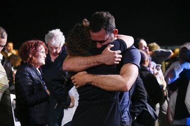 People embrace at a joint memorial ceremony for Palestinians and Israelis in Tel Aviv last year. The recognition of common humanity and the demand for an end to war and occupation are important responses to dehumanisation or indifference to the suffering felt by the 'other side'. Photo: Combatants for Peace