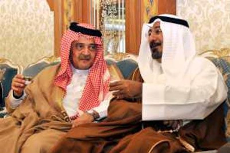 The Saudi foreign minister Prince Saud al Faisal, left, with his Kuwaiti counterpart, Sheikh Mohammed Sabah al Salim al Sabah, in Jeddah