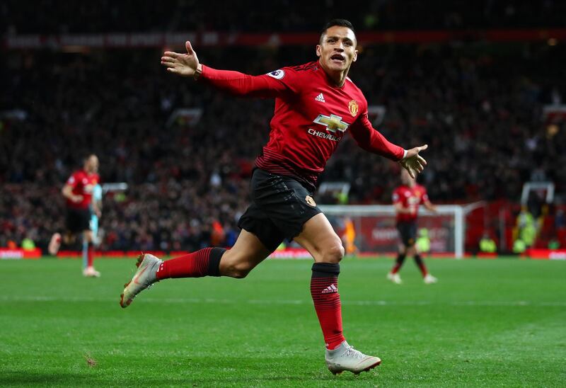 Manchester United's Alexis Sanchez celebrates completing his side's dramatic comeback. Getty Images