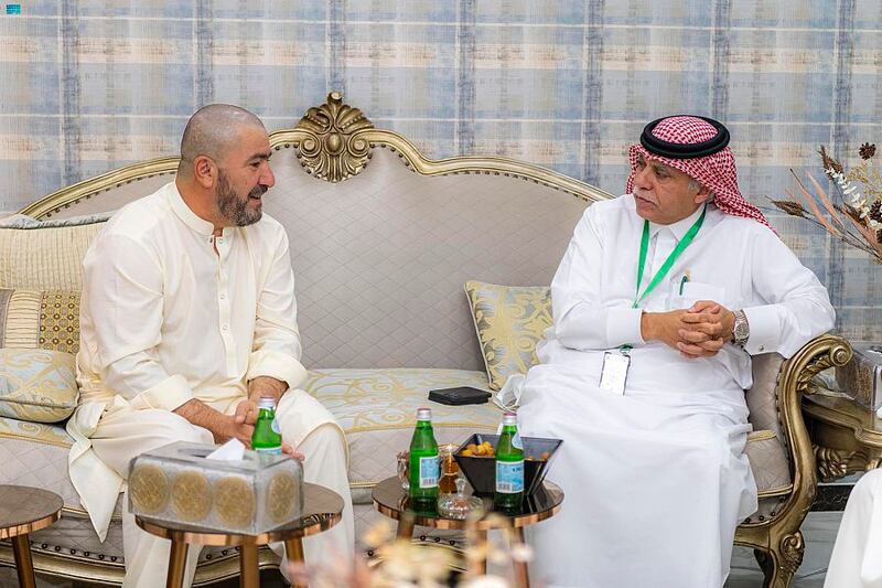 Adam Mohammed, 52, meets Dr Majid Al Qasabi, Saudi Arabia’s Acting Minister of Information, in Mina, after walking from Britain to the kingdom to perform Hajj. Photo: SPA