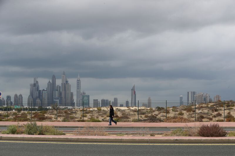 Dark rain clouds over Dubai in January. Pawan Singh / The National