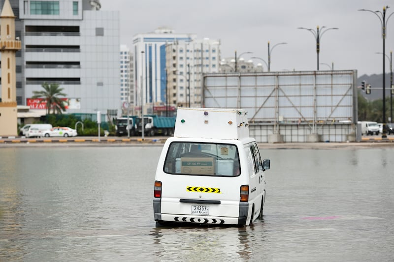 A stalled minibus on a street in Fujairah. Khushnum Bhandari / The National