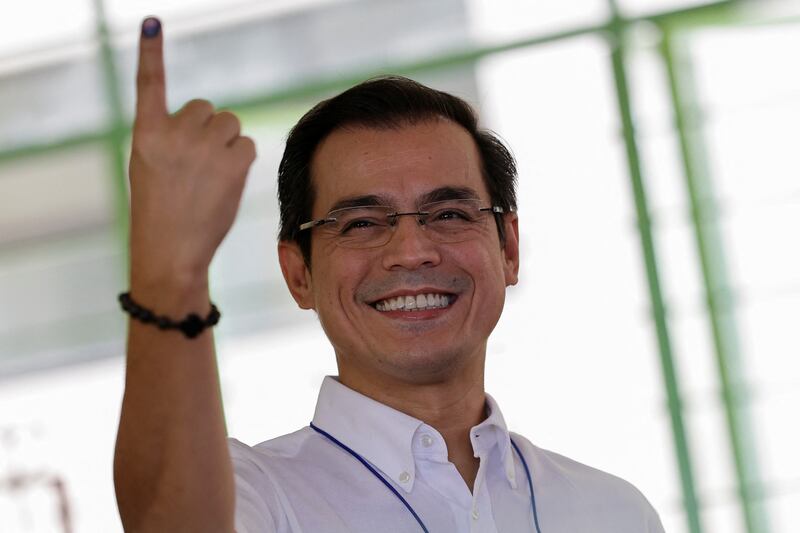 Presidential election candidate, Manila mayor Francisco "Isko Moreno" Domagoso, gestures after casting his ballot. Reuters