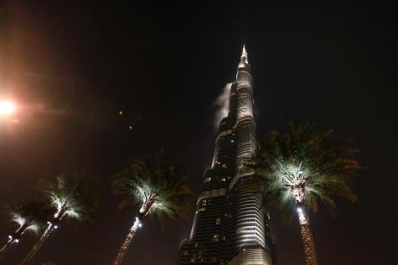 Dubai, January 22, 2013 - A cloud behind the Burj Khalifa looks like smoke from a fire in Dubai, January 22, 2013. (Photo by: Sarah Dea/The National)