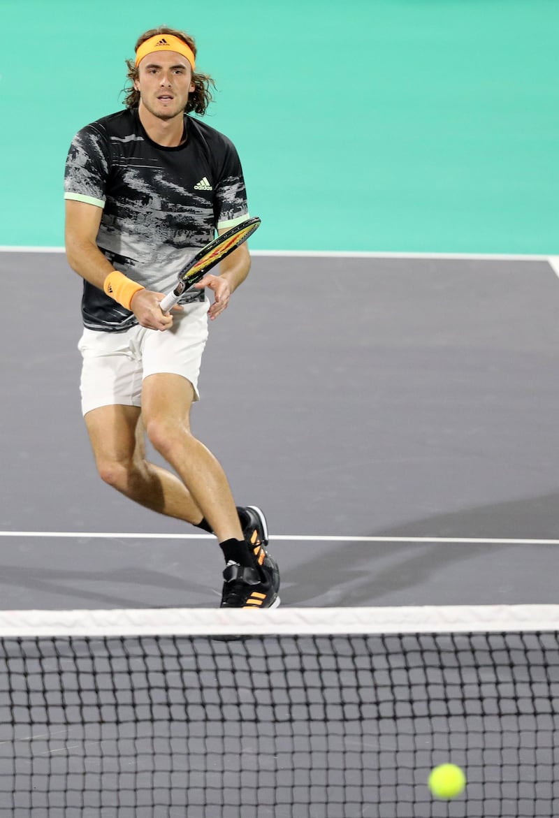 Abu Dhabi, United Arab Emirates - Reporter: Jon Turner: Stefanos Tsitsipas plays a shot during the final between Rafael Nadal v Stefanos Tsitsipas at the Mubadala World Tennis Championship. Saturday, December 21st, 2019. Zayed Sports City, Abu Dhabi. Chris Whiteoak / The National